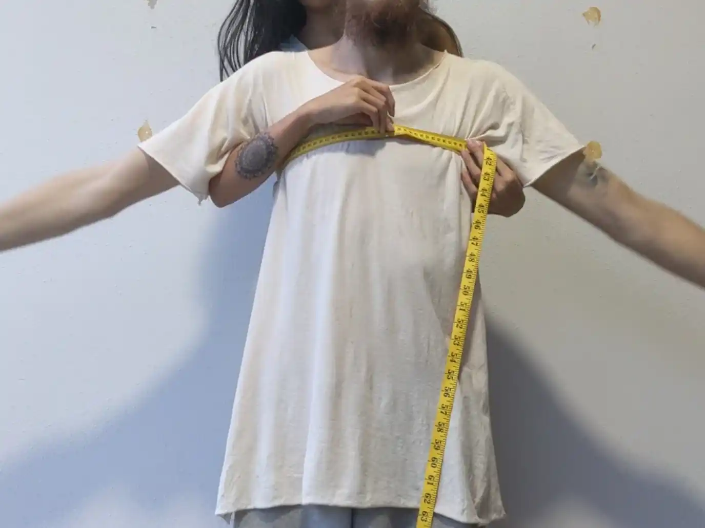 take bust/chest circumference measurement with arms parallel to the floor extended straight
